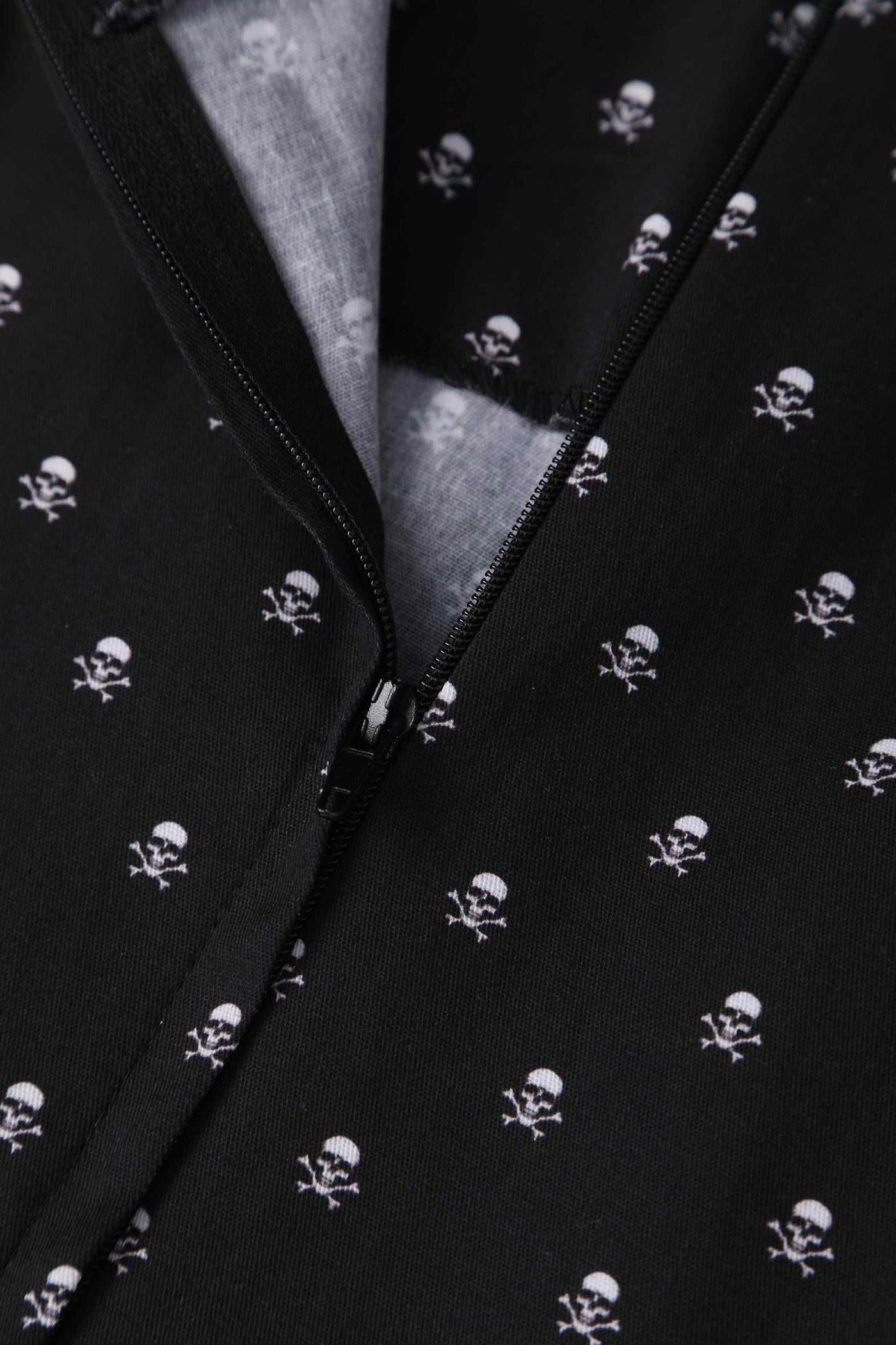 Close up view of black skull print vintage style swing dress