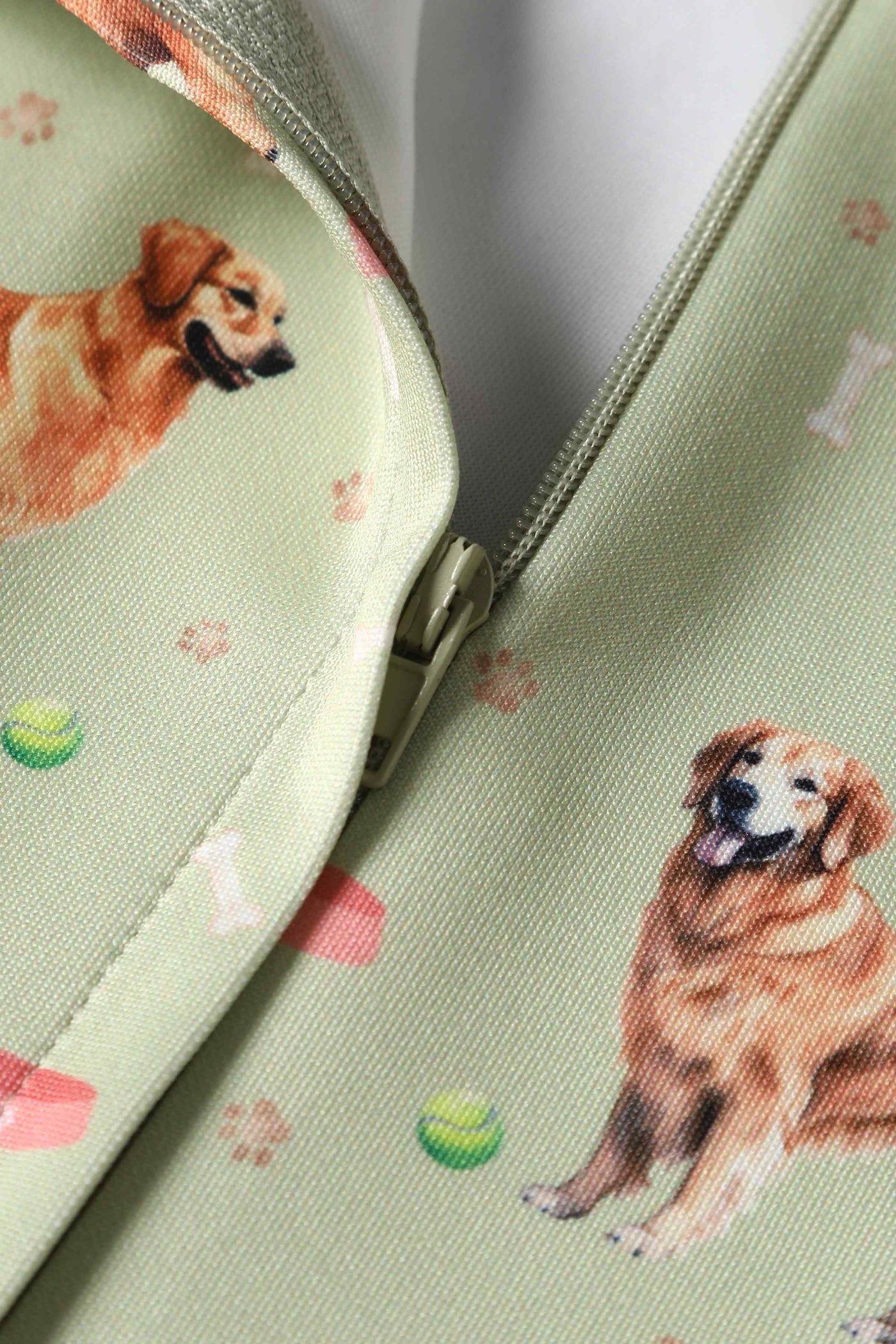 Close up View of Golden Retriever Flared Dress in Green