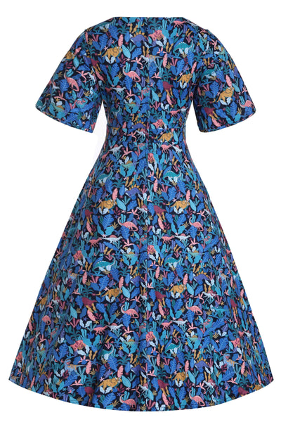 Short sleeve swing dress, with dinosaur leaf print, in navy blue, Back View