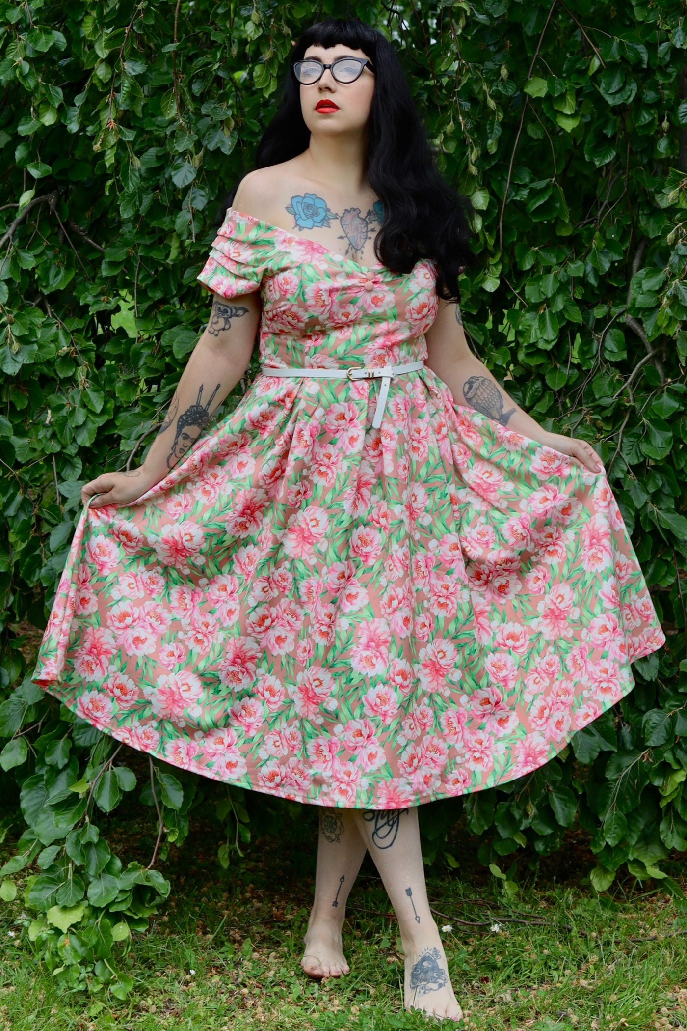 Model wearing a Pink Floral Off Shoulder Dress