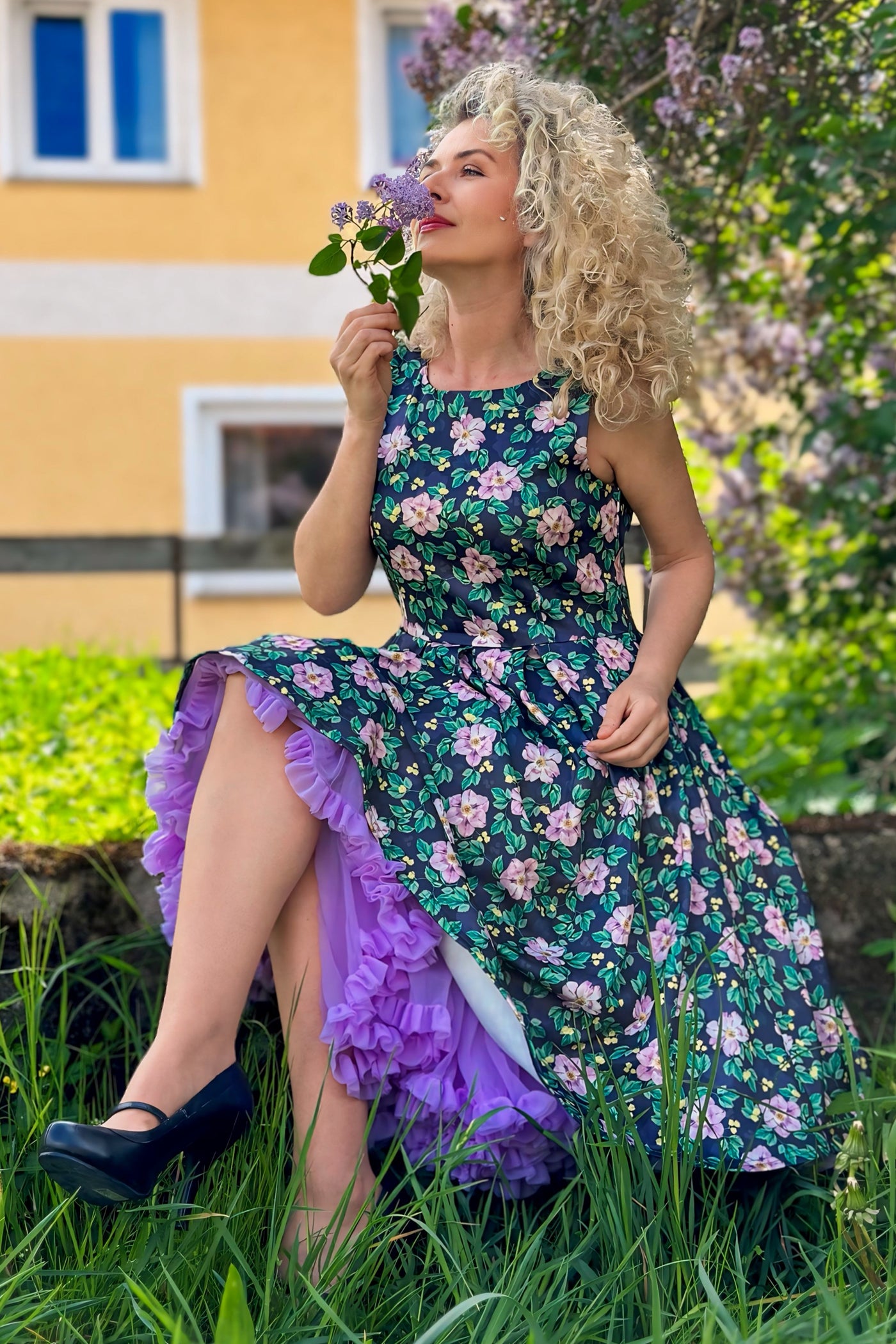 Model wearing a Purple Floral Swing Dress