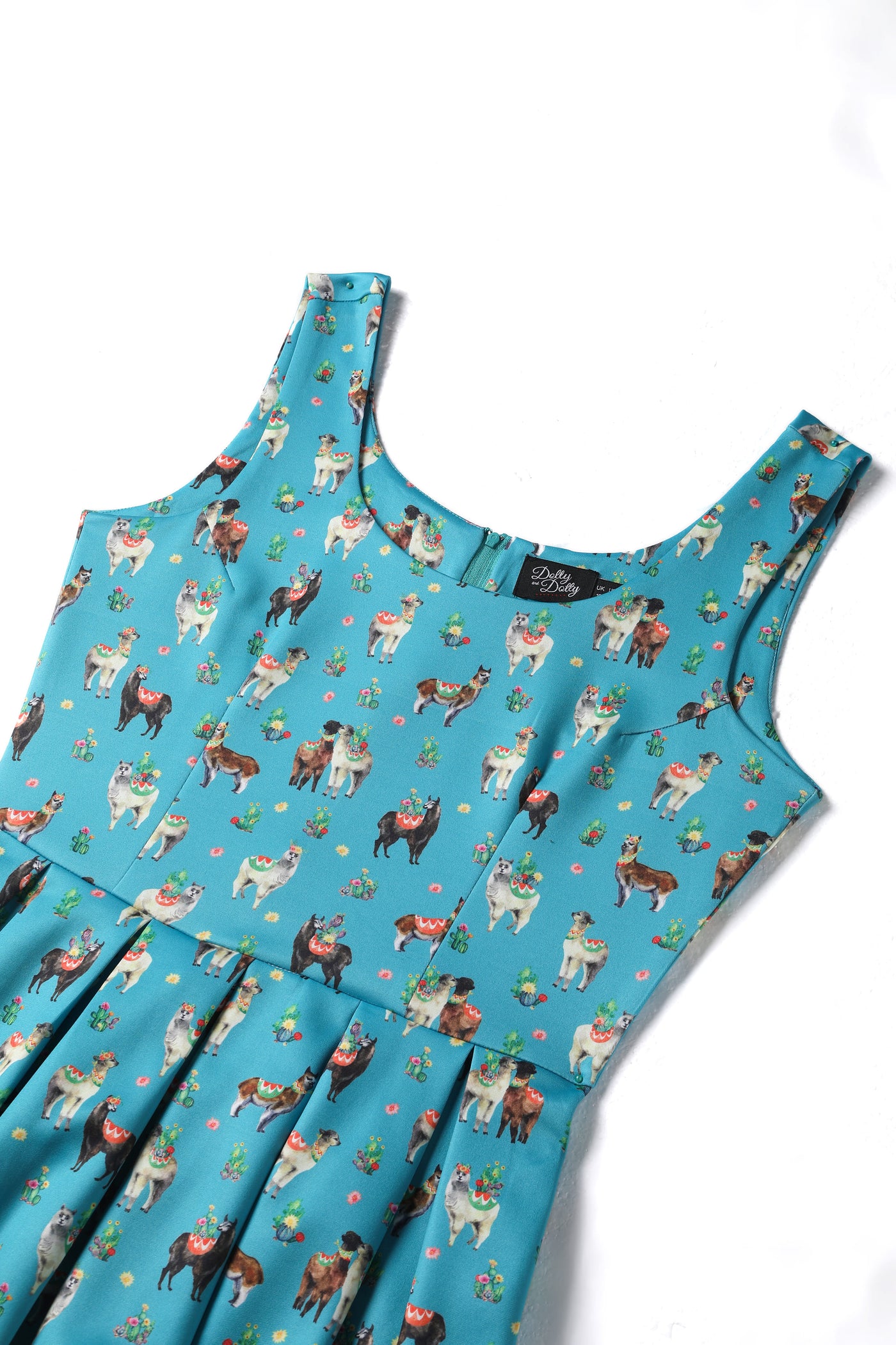 Top view of our sleeveless Amanda swing dress, in turquoise llama cactus print