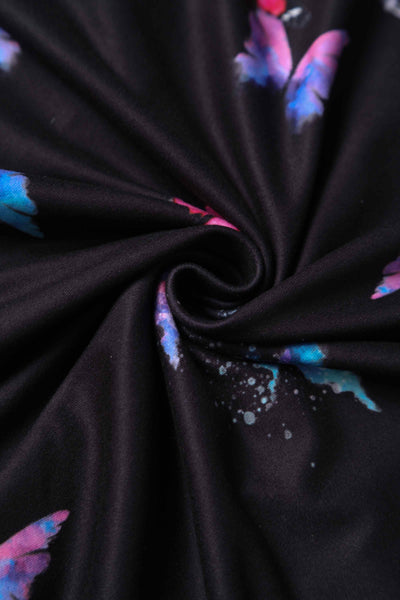 Close up View of Butterfly Print Long Sleeved Swing Dress in Black
