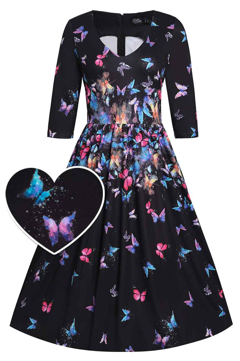 Front View of Butterfly Print Long Sleeved Swing Dress in Black