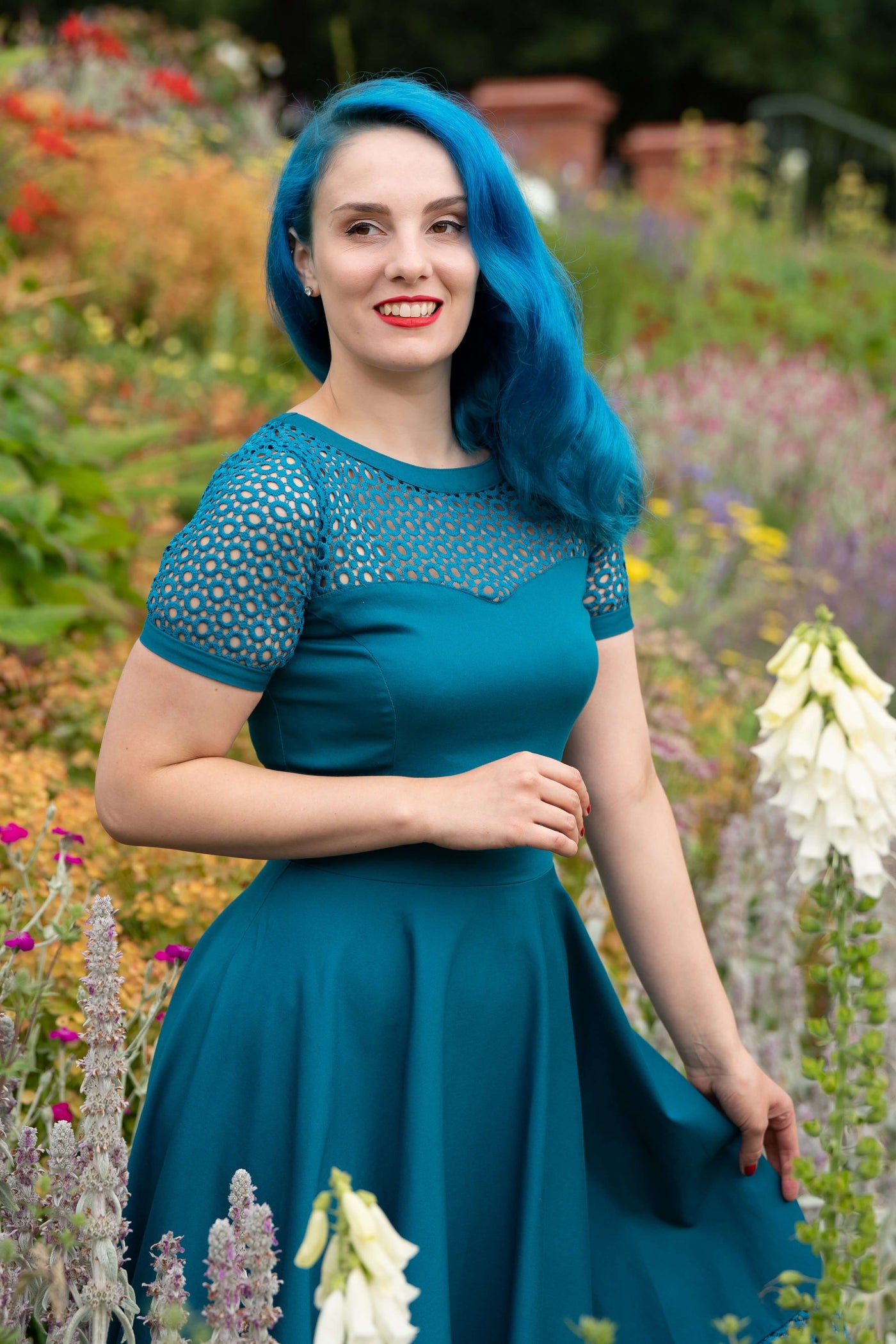 minavonvixen in Crochet Lace Sleeved Occasion Formal Dress in Peacock Blue close up 