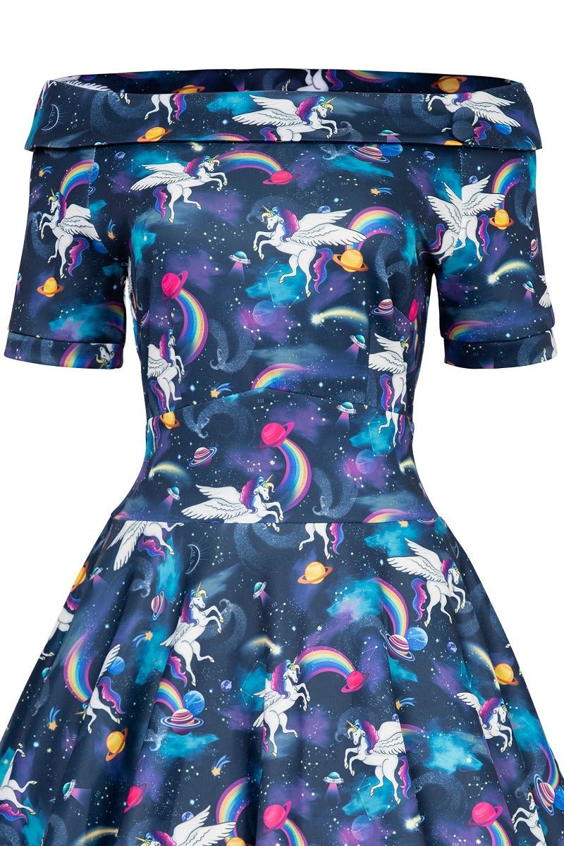Blue bateau neckline dress with unicorn rainbow print close up