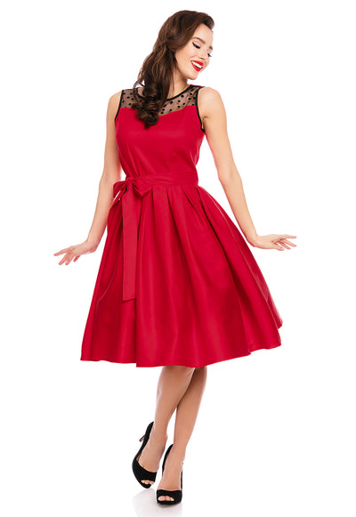 Model wearing red retro dress front view