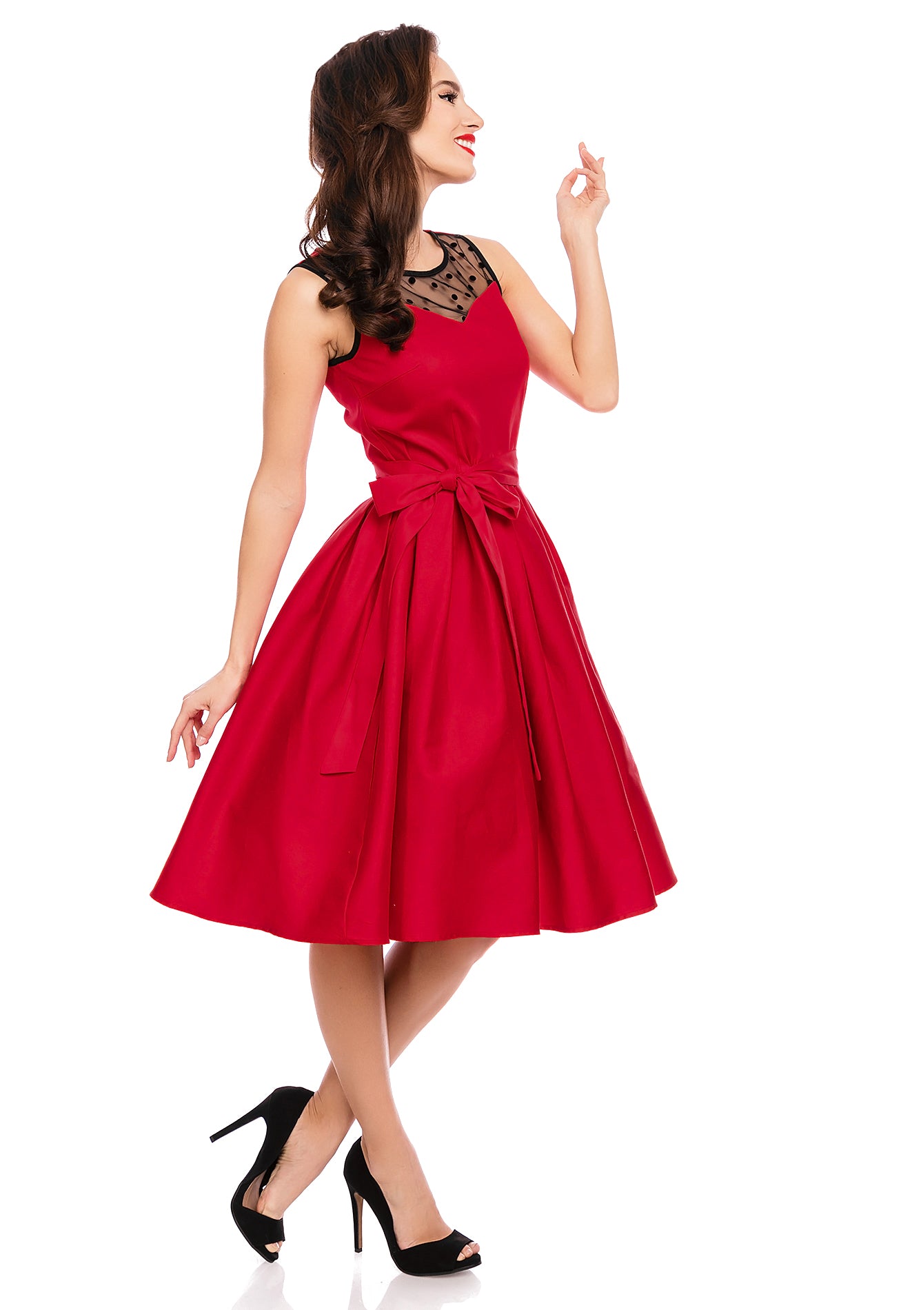 Model wearing red retro dress side view
