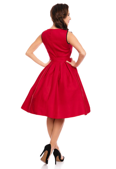 Model wearing red retro dress back view