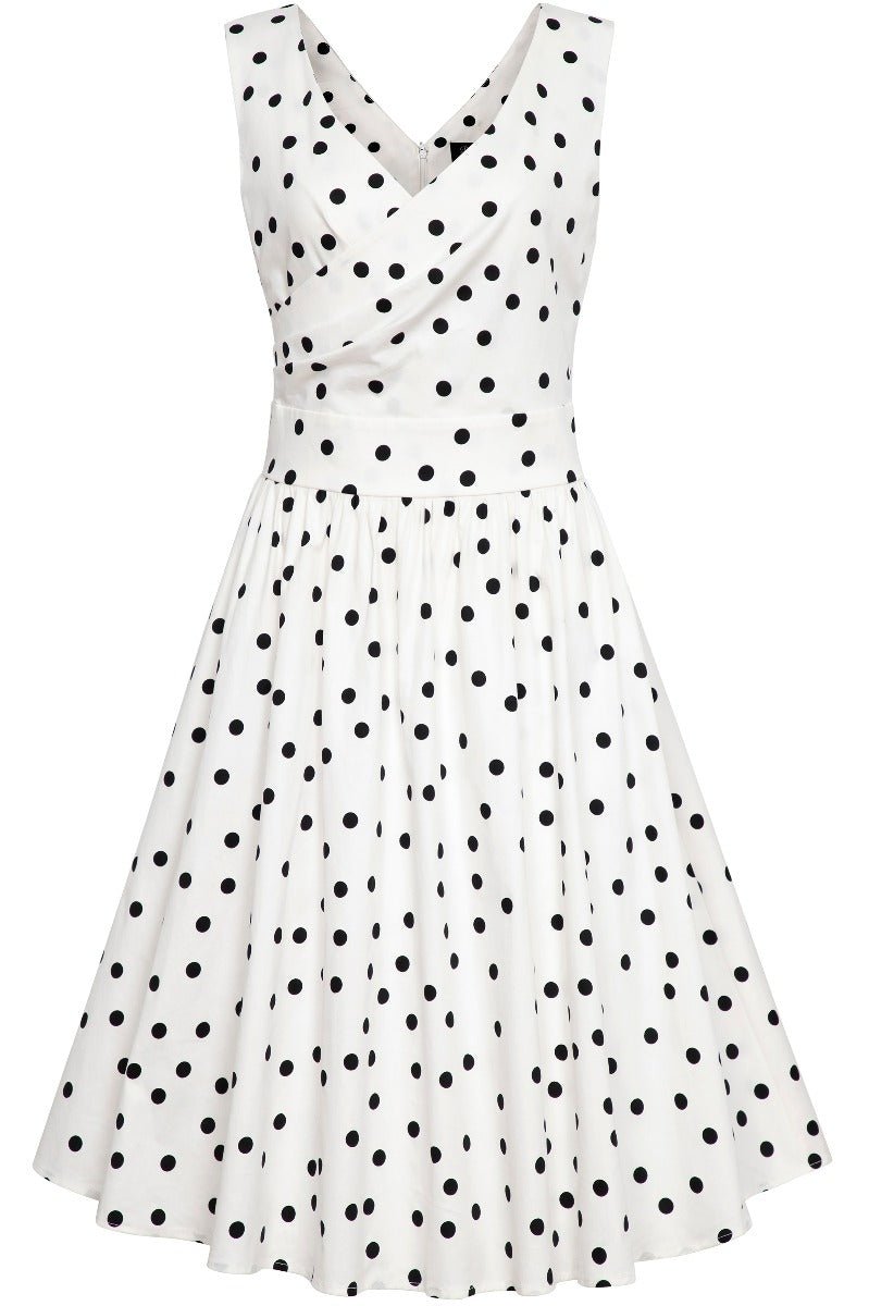 White wrap bust dress with black polka dots