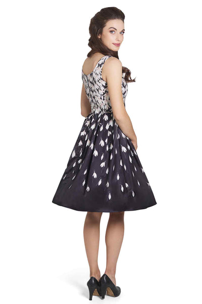 Model wearing 50s Inspired Black Swing Dress & Snowdrops