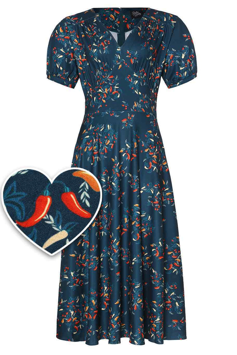 Front view of short sleeved blue midi dress, with red chili print
