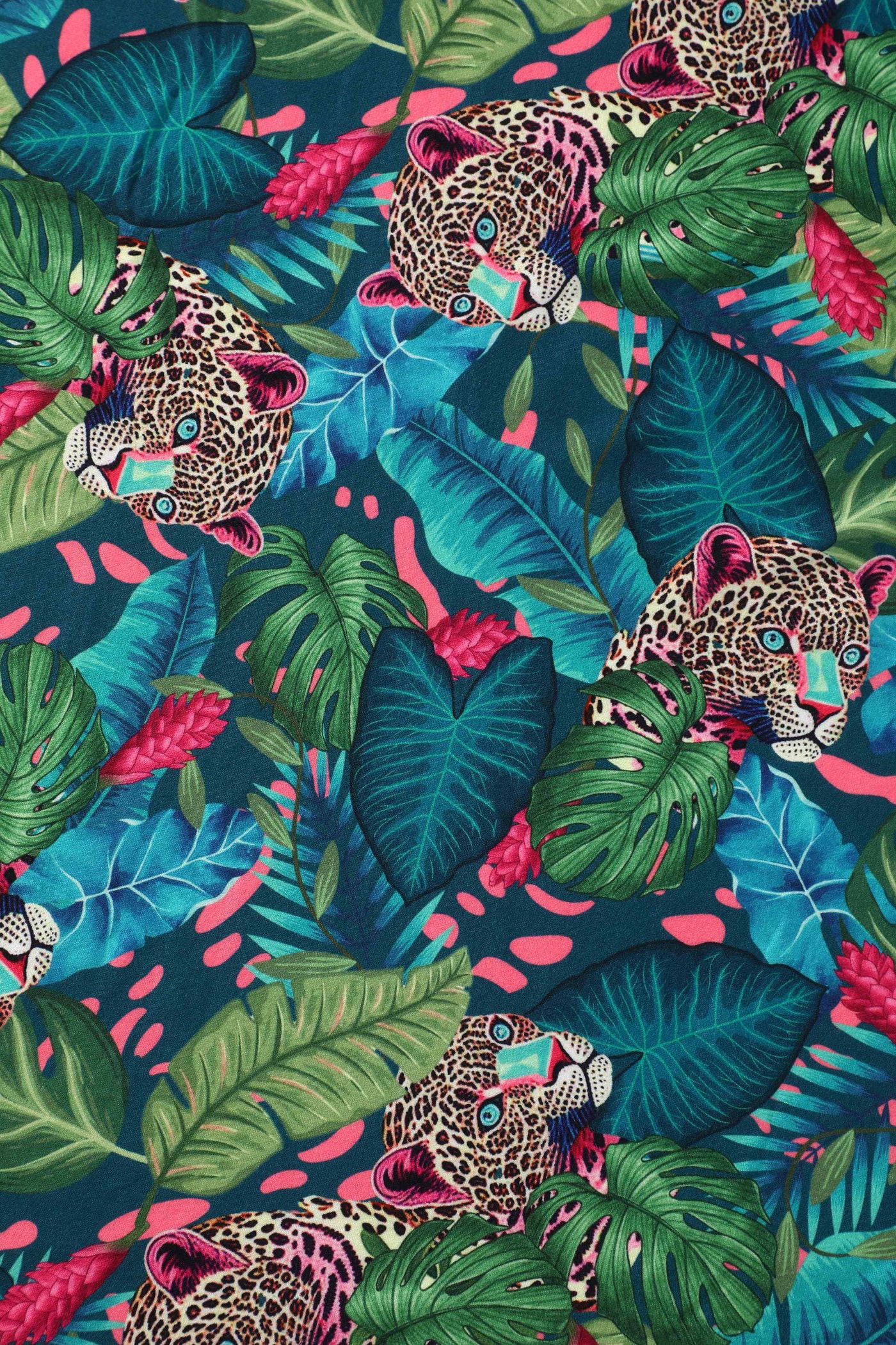 Fabric view of our short sleeved midi dress in tropical jungle cheetah print
