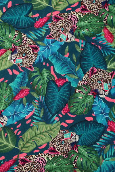 Fabric view of our short sleeved midi dress in tropical jungle cheetah print