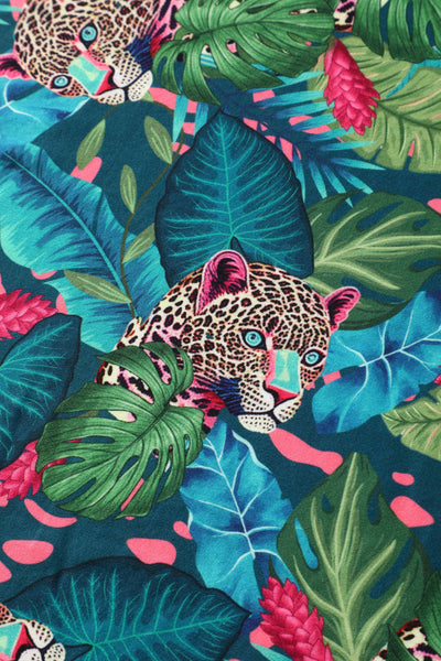 Fabric view of our short sleeved midi dress in tropical jungle cheetah print