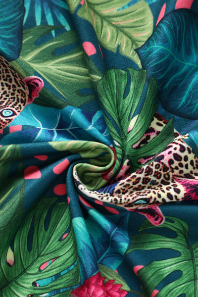 Fabric view of our short sleeved midi dress in tropical jungle cheetah print