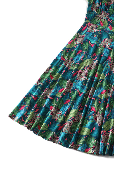 Skirt view of our short sleeved midi dress in tropical jungle cheetah print