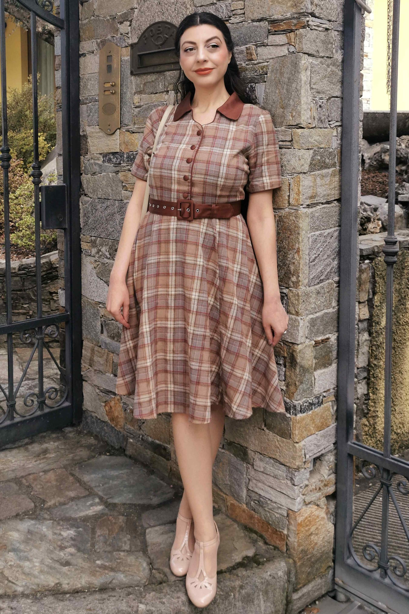 A lady wearing a Brown Tartan Shirt Dress