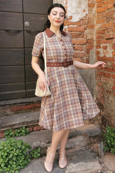 A lady wearing a Brown Tartan Shirt Dress