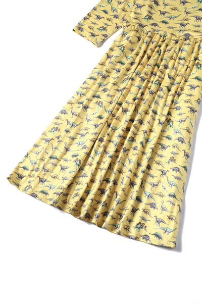 Close up view of Dinosaur Yellow Long Sleeved Dress