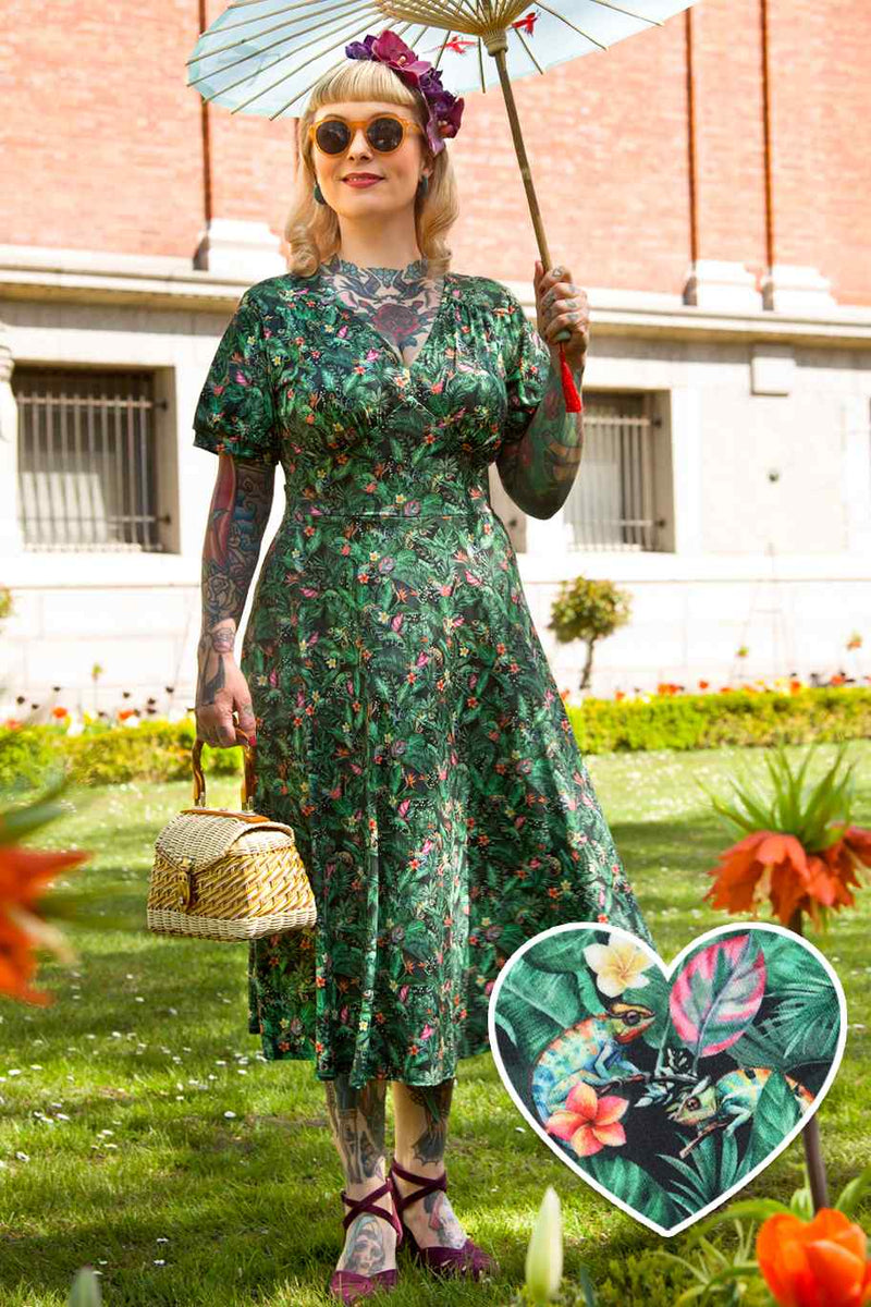 A model wearing Chameleon Midi Dress In Green