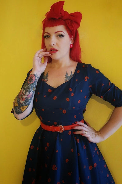 Close up view of Long Sleeved Midi Dress in Navy & Red Poppy