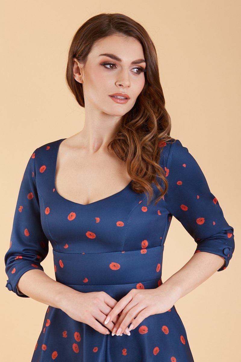 Close up of Long Sleeved Midi Dress in Navy & Red Poppy
