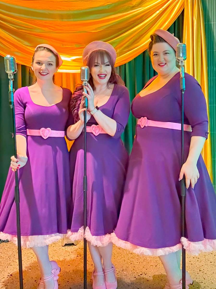 Ladies wearing the Scarlette Long Sleeved Purple Midi Dress