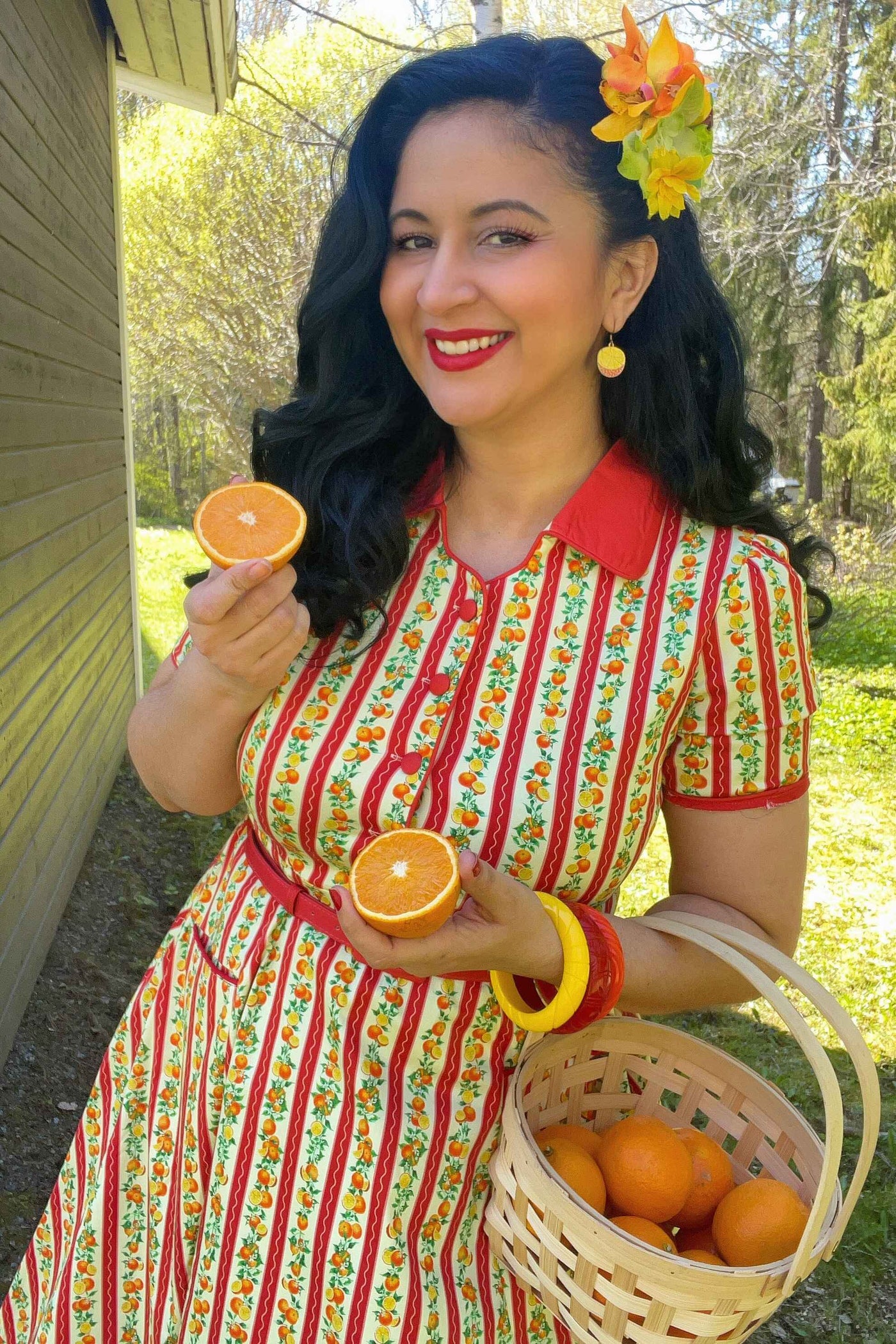 Model Linda wearing a Mabel Summer Orange Midi Shirt Dress