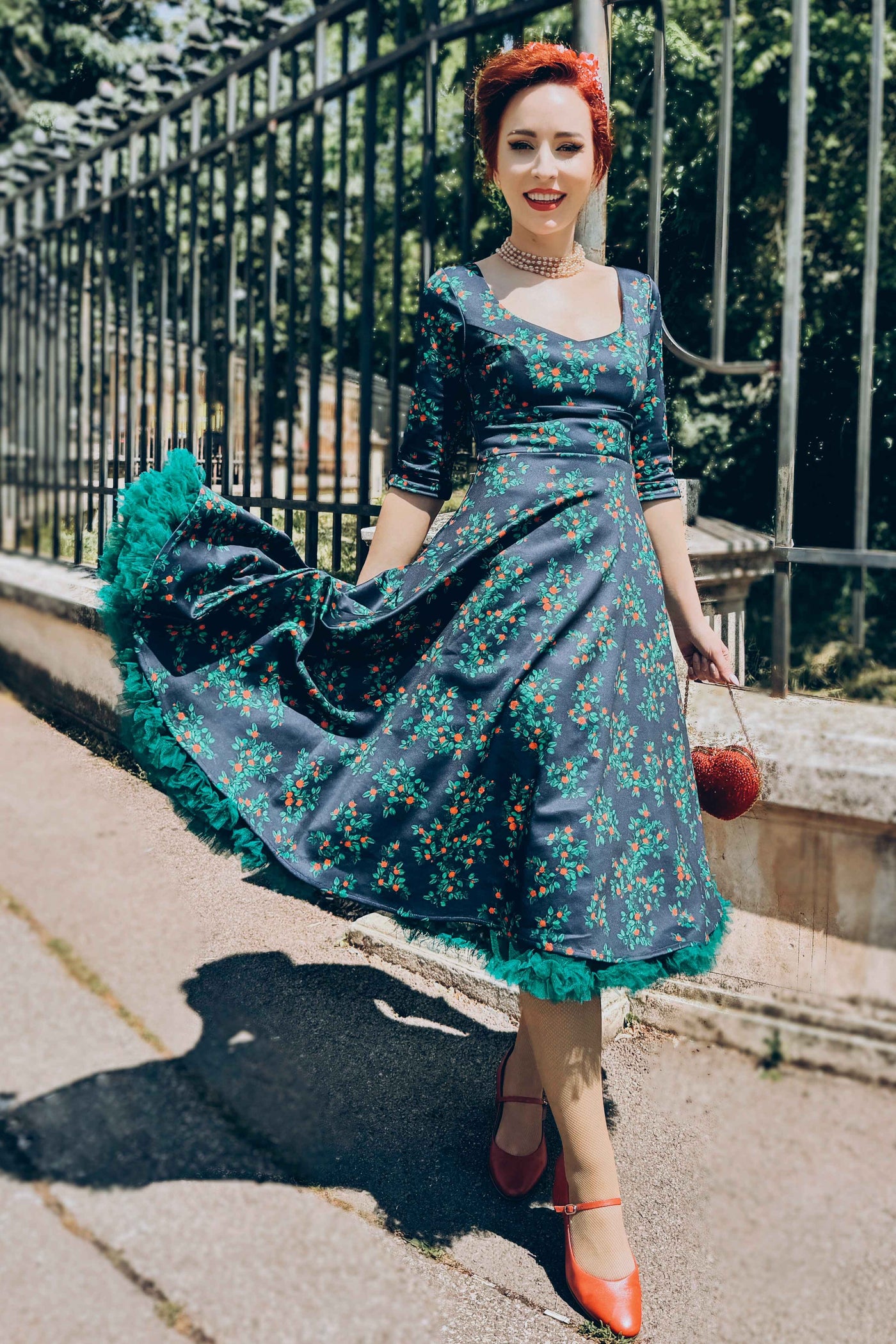 Model Mireladumitrescu1 wearing a Scarlette Rosebud Midi Dress On Navy Blue