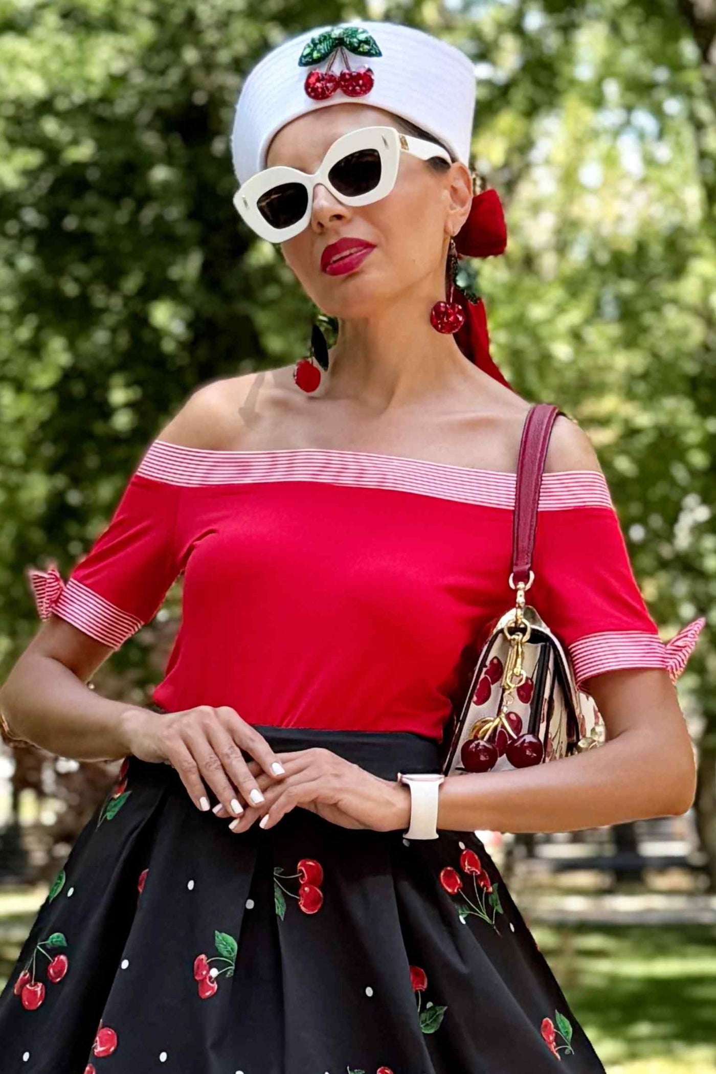 A model wearing a Layla Off Shoulder Red Striped Trim Top