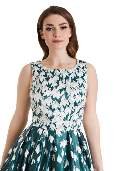 A model wearing Retro Flared Dress in Myrtle Green with Snowdrop Tulip Print