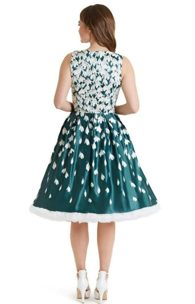 A model wearing Retro Flared Dress in Myrtle Green with Snowdrop Tulip Print