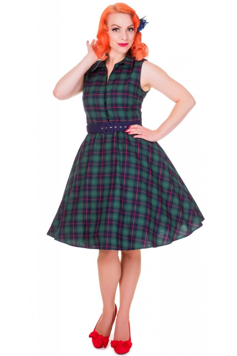 Model wears our sleeveless Poppy button up dress in green tartan print, front view