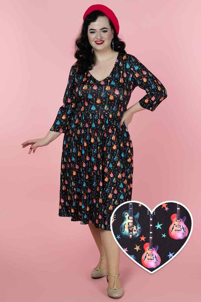 A model wearing a Rockstar Black Long Sleeved Dress