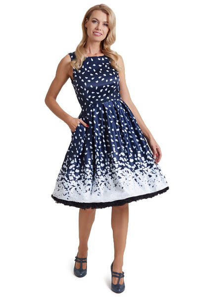 Model wearing Swing Dress in Navy with Painted Dots