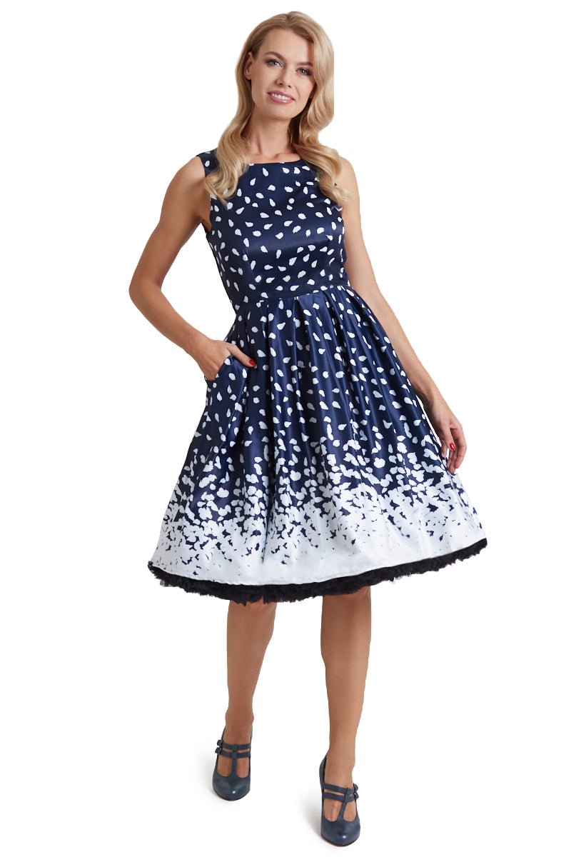 Model wearing Swing Dress in Navy with Painted Dots