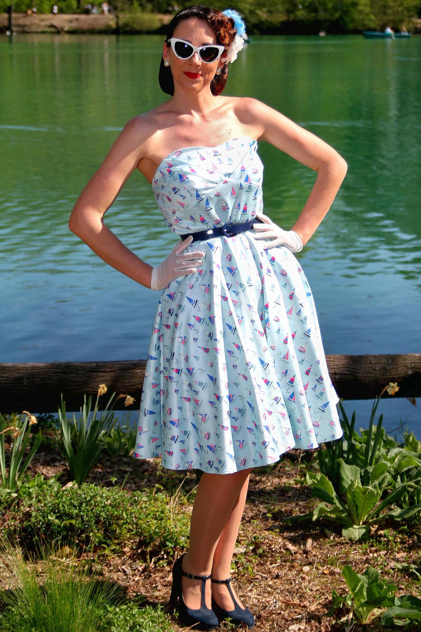 A model wearing a Light Blue Nautical Sailboat Strapless Dress