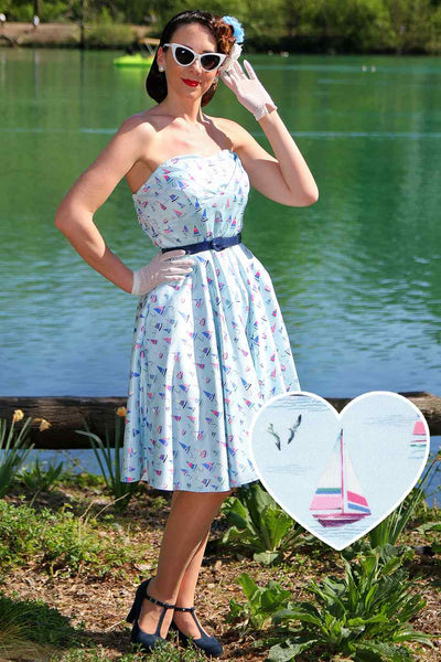 A model wearing a Light Blue Nautical Sailboat Strapless Dress