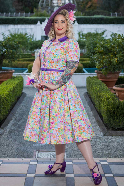 A lovely lady wearing a Mabel Pastel Seashell Midi Shirt Dress