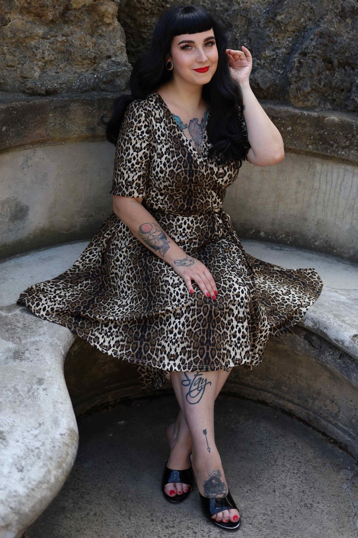 A model in Matilda Retro Leopard Print Casual Wrap Dress