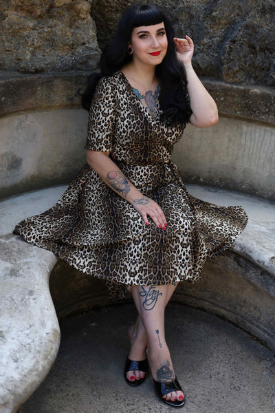 A model in Matilda Retro Leopard Print Casual Wrap Dress