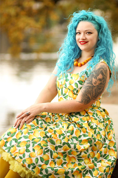 A lady wearing an Amanda Lemon Flared Dress In White