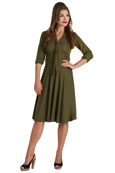 A model wearing Vintage-Inspired Stretchy Bow Tie Dress