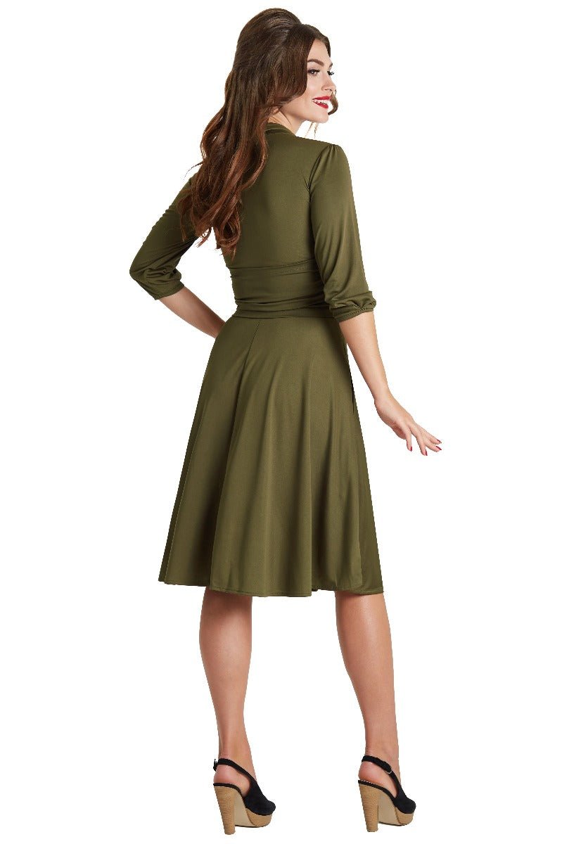 A model wearing Vintage-Inspired Stretchy Bow Tie Dress