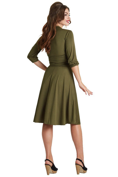 A model wearing Vintage-Inspired Stretchy Bow Tie Dress