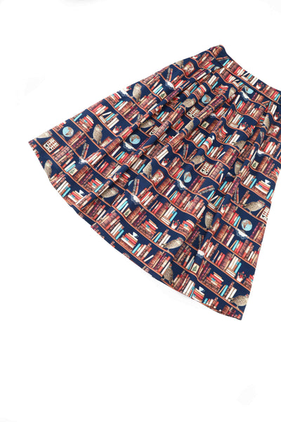 Close up view of Aisley Book & Owl Pleated Midi Skirt
