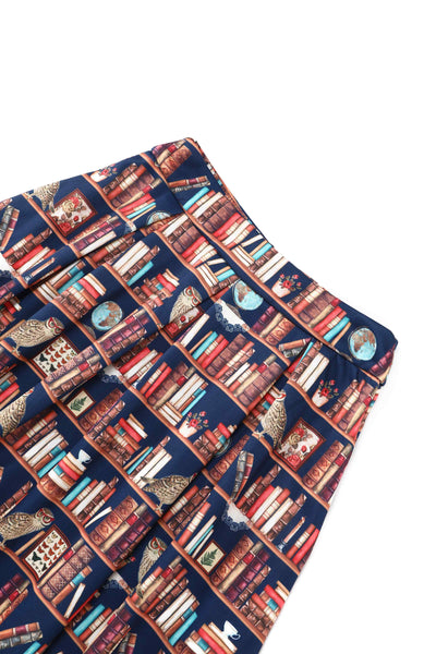 Close up view the waistband of Aisley Book & Owl Pleated Midi Skirt