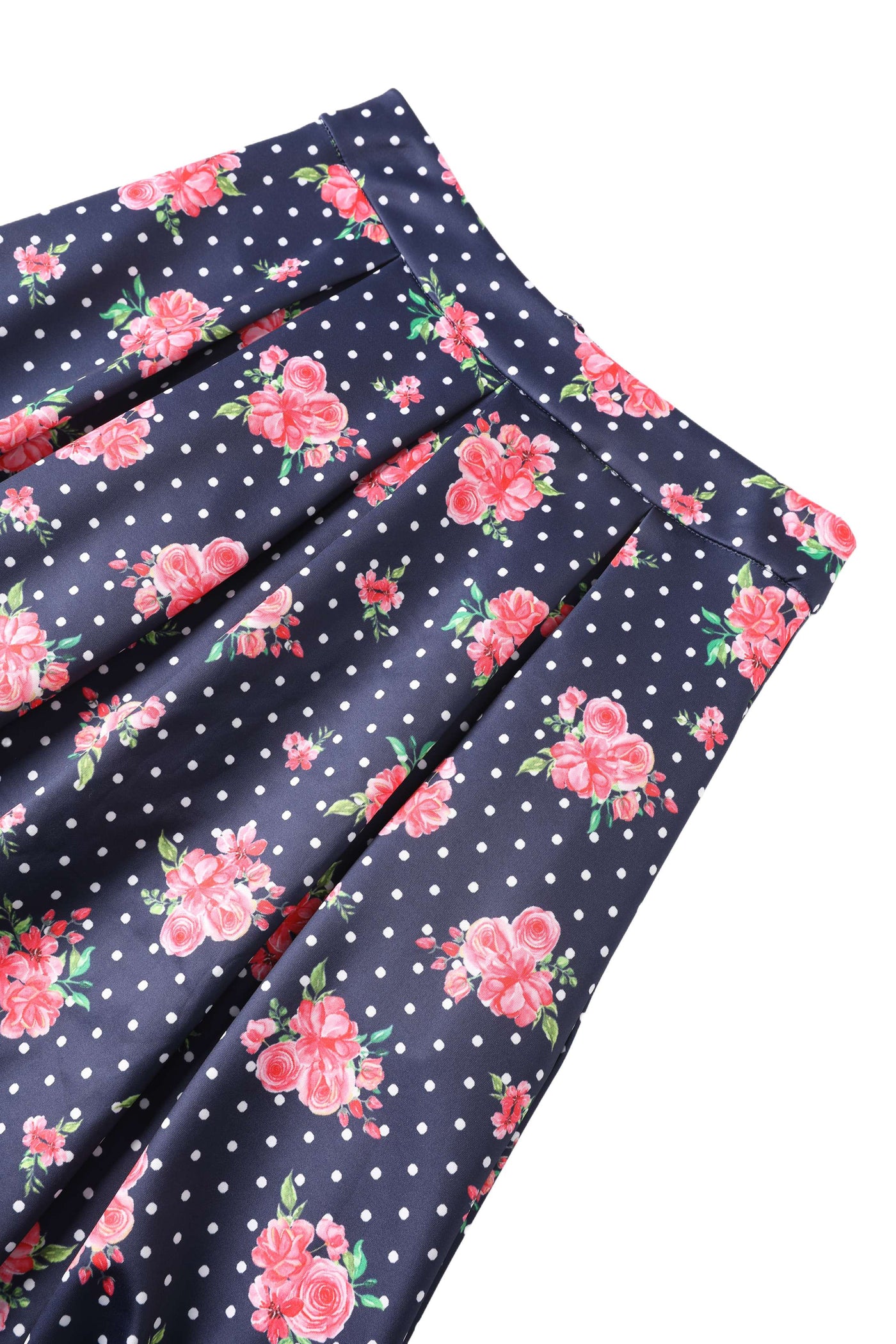 Close up view the waist band of Aisley Pink Rose Midi Skirt In Blue