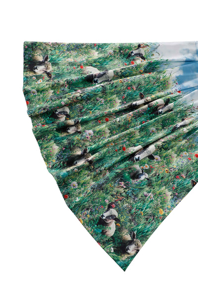 Close up view of Aisley Dinosaur Extinction Pleated Midi Skirt